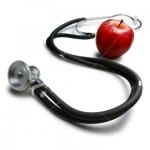 ist2_5415608-stethoscope-and-apple-on-a-white-background