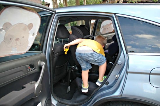 Logan climbing into car 2