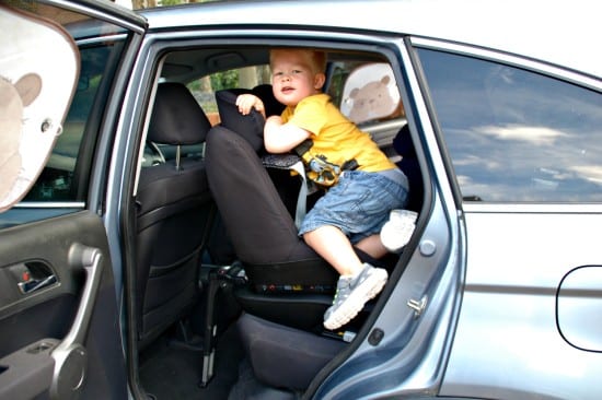 logan climbing into the car 3