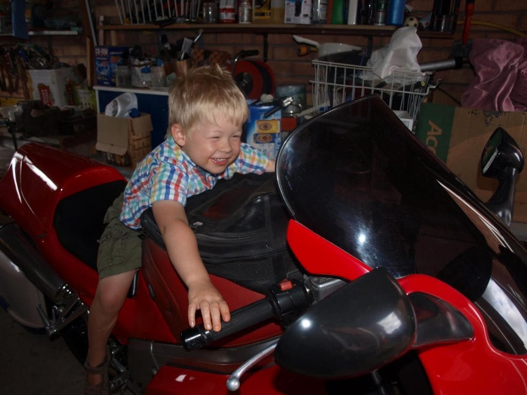 Logan on Ben's motorbike