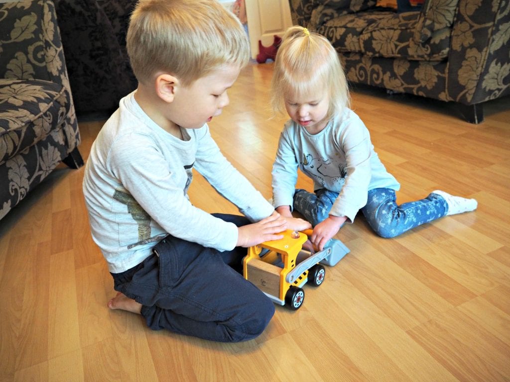 Hape-Great-Big-Digger-Review-Logan-and-Aria-playing