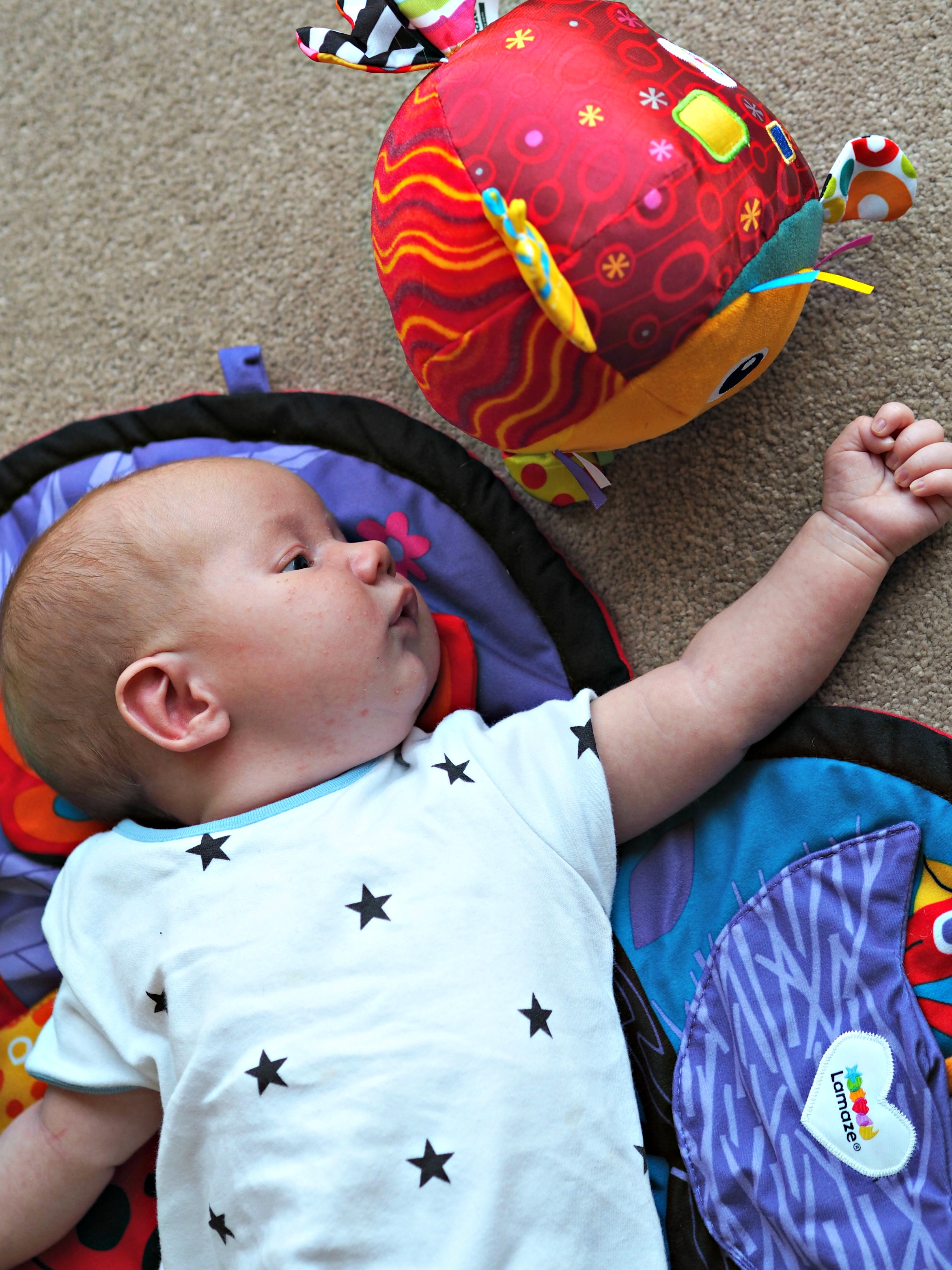 Encouraging Baby's Development with Tomy Lamaze - Bo with new toys 2