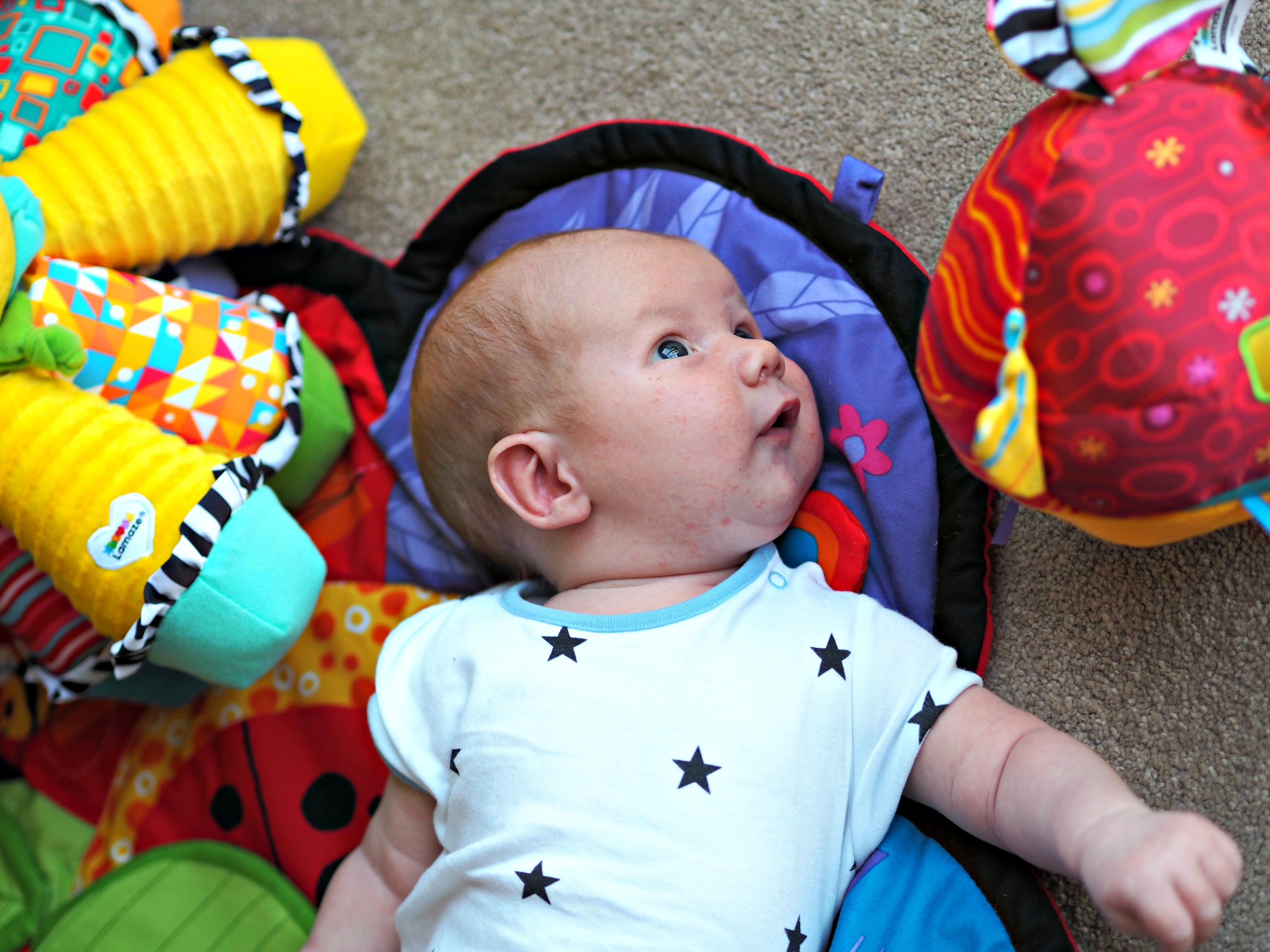 Encouraging Baby's Development with Tomy Lamaze - Bo with new toys