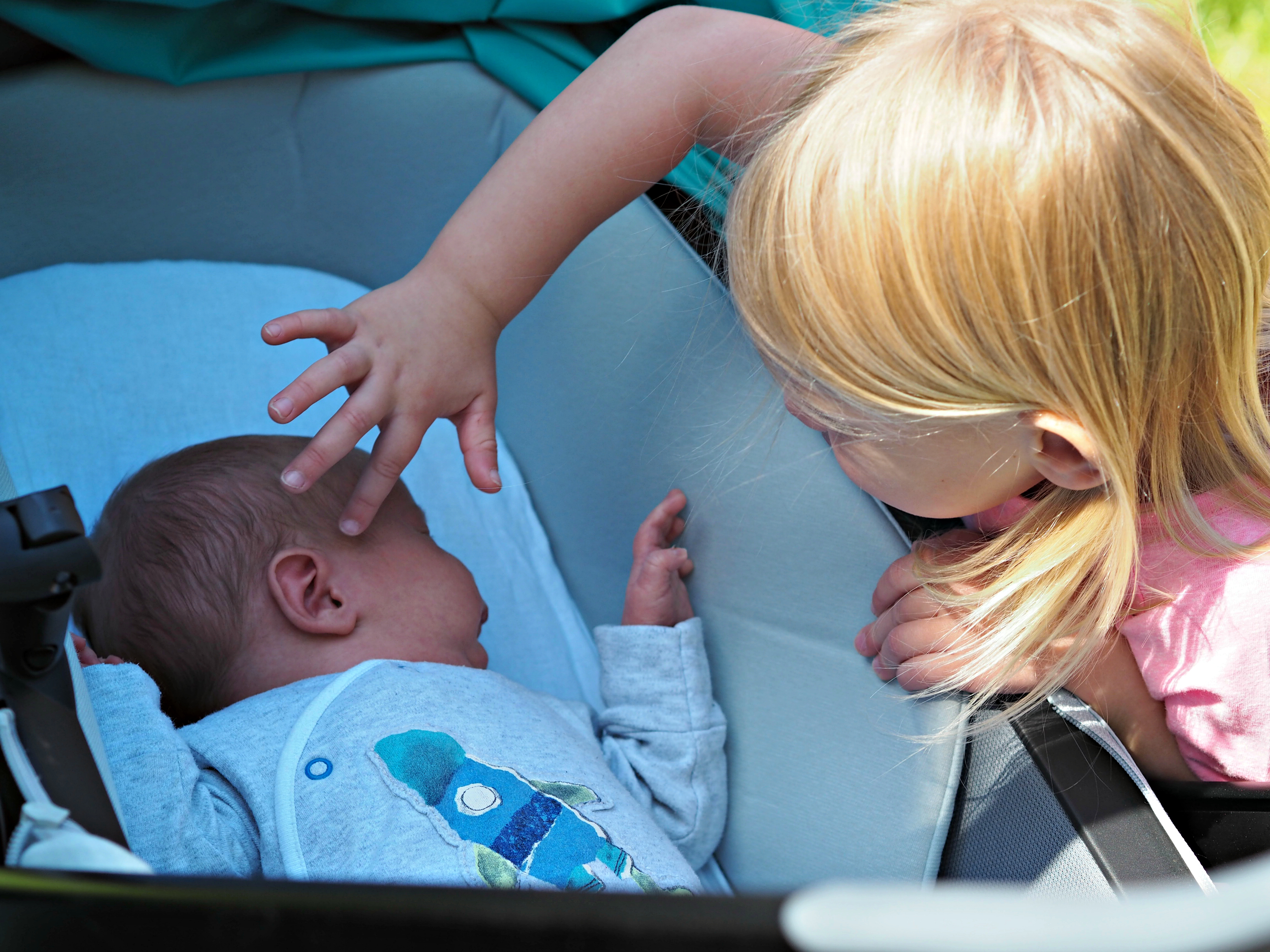 Quinny Zapp Flex Plus Carrycot Review - Aria stroking Bo's head