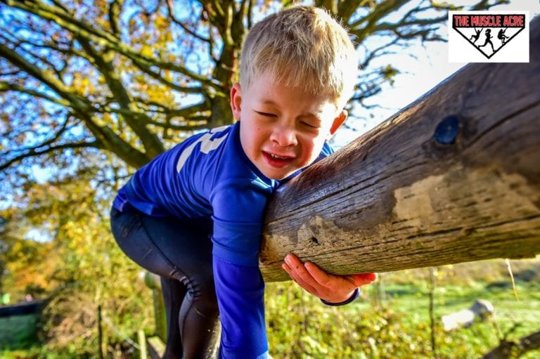 BEN'S ZONE: Muscle Acre Mud Slog 2018 Review - Logan on obstacle