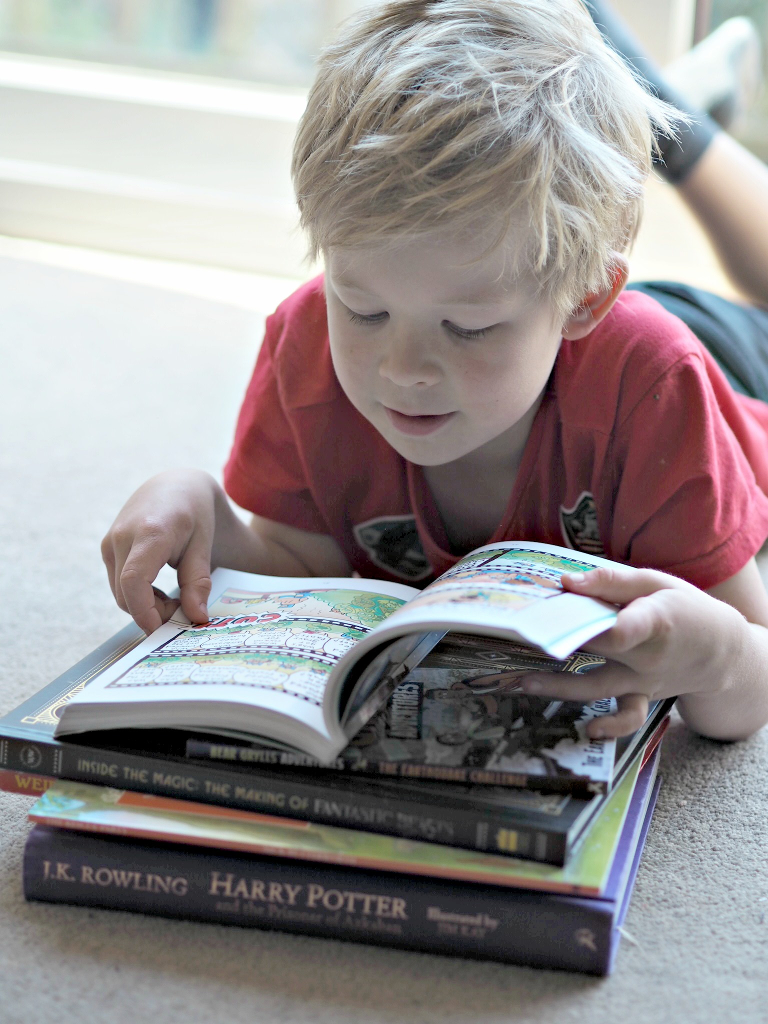 When You Suspect Your Child Might be Gifted - Logan lying down reading books