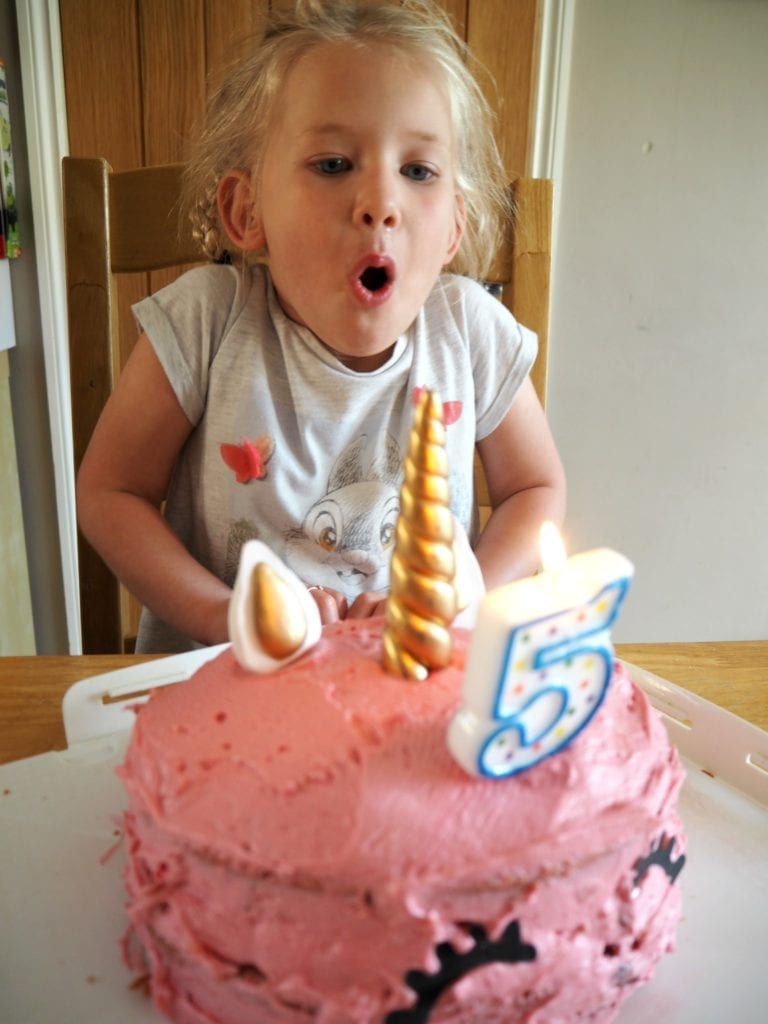 Lovely Things May 2019 - Aria blowing out her candles