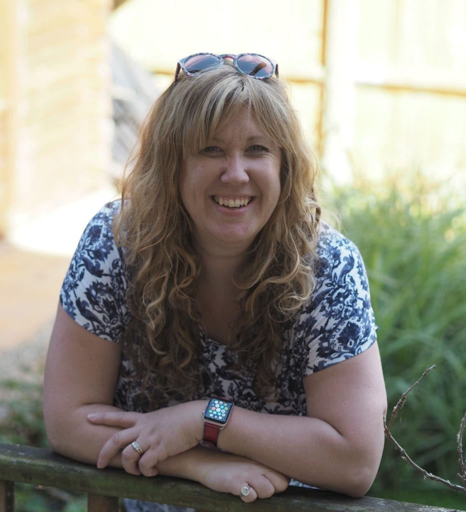 My Stomach Ulcer One Year On & Birth Trauma - Me leaning on a fence in a Joules top, sunglasses on my head