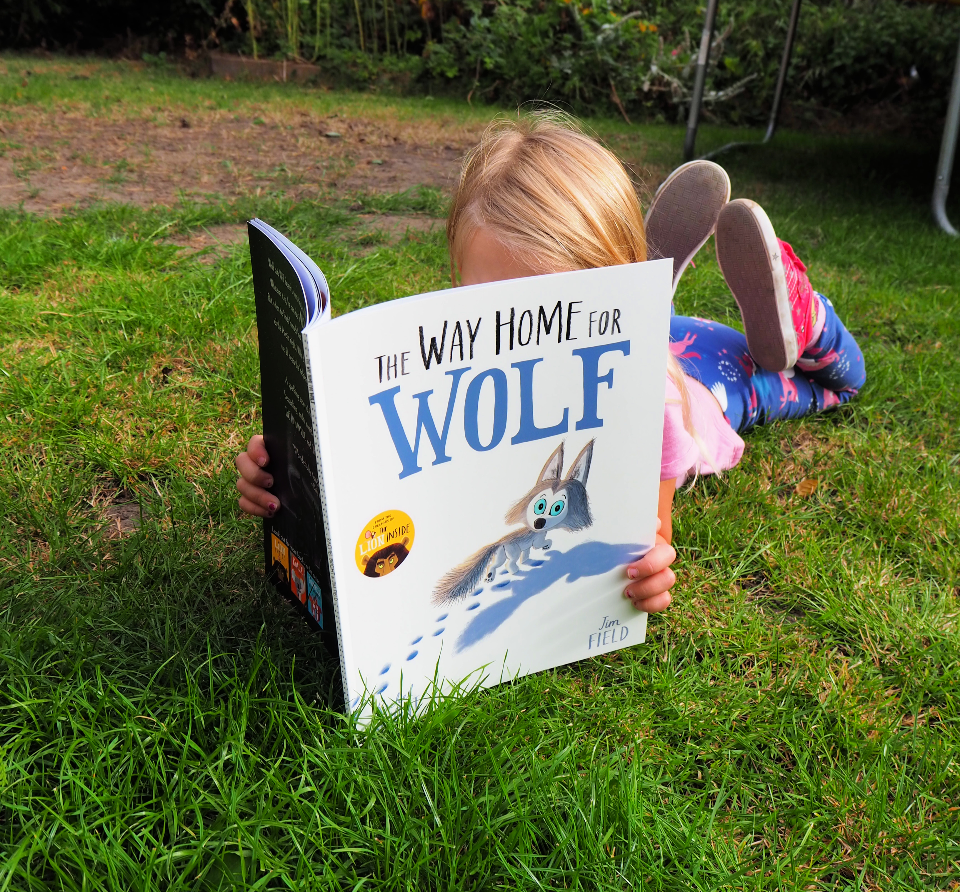 The Way of the Wolf book review - Aria lying on the grass