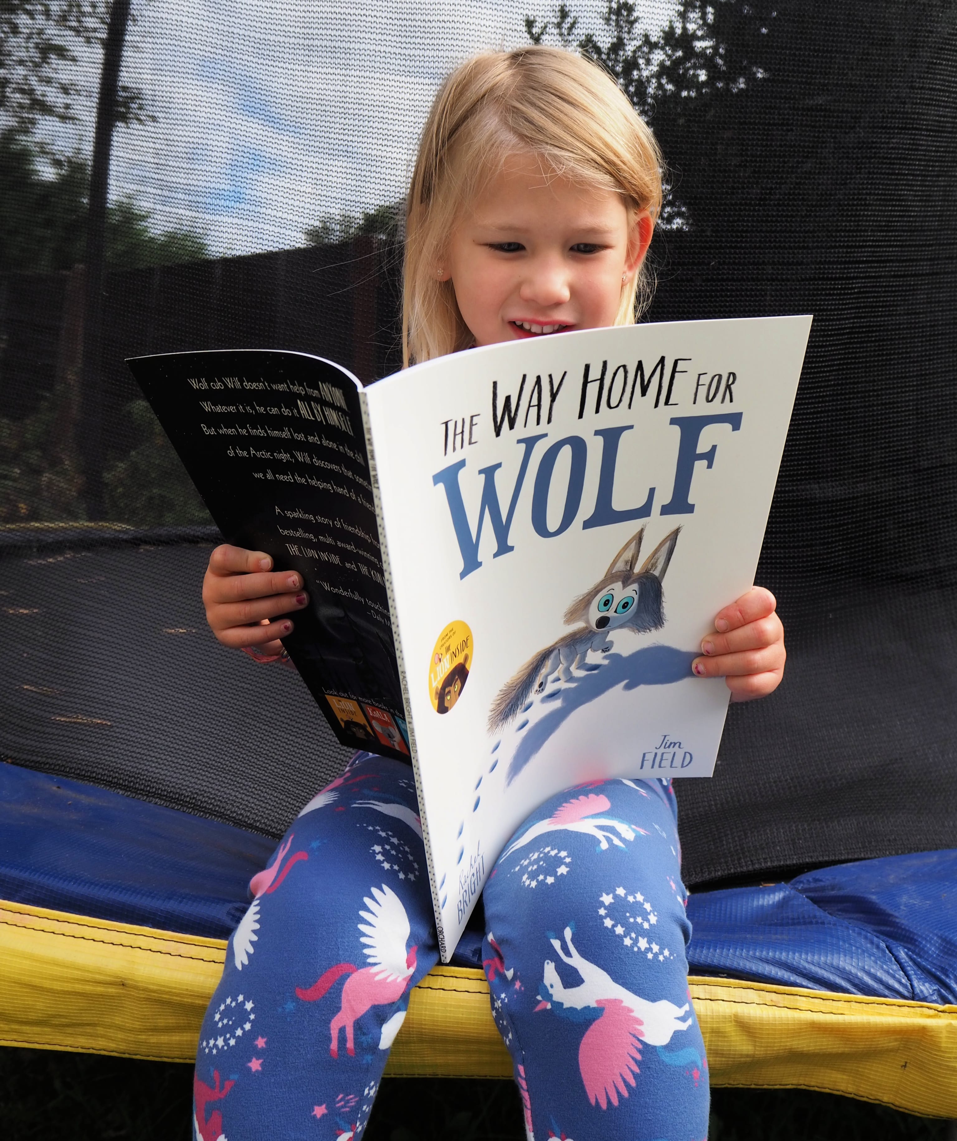 The Way of the Wolf book review - Aria sitting on trampoline