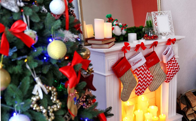 Beautiful fireplace with stockings decorated for Christmas