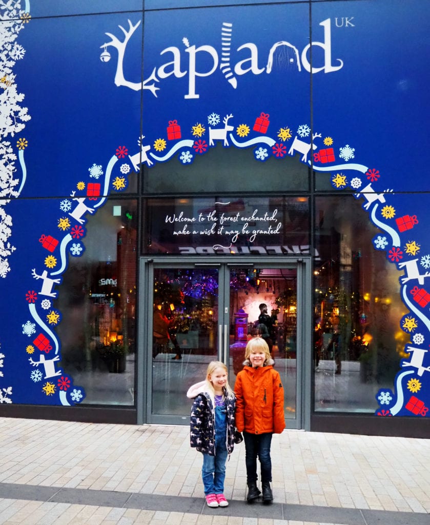 Logan and Aria outside the Lapland UK wishing store