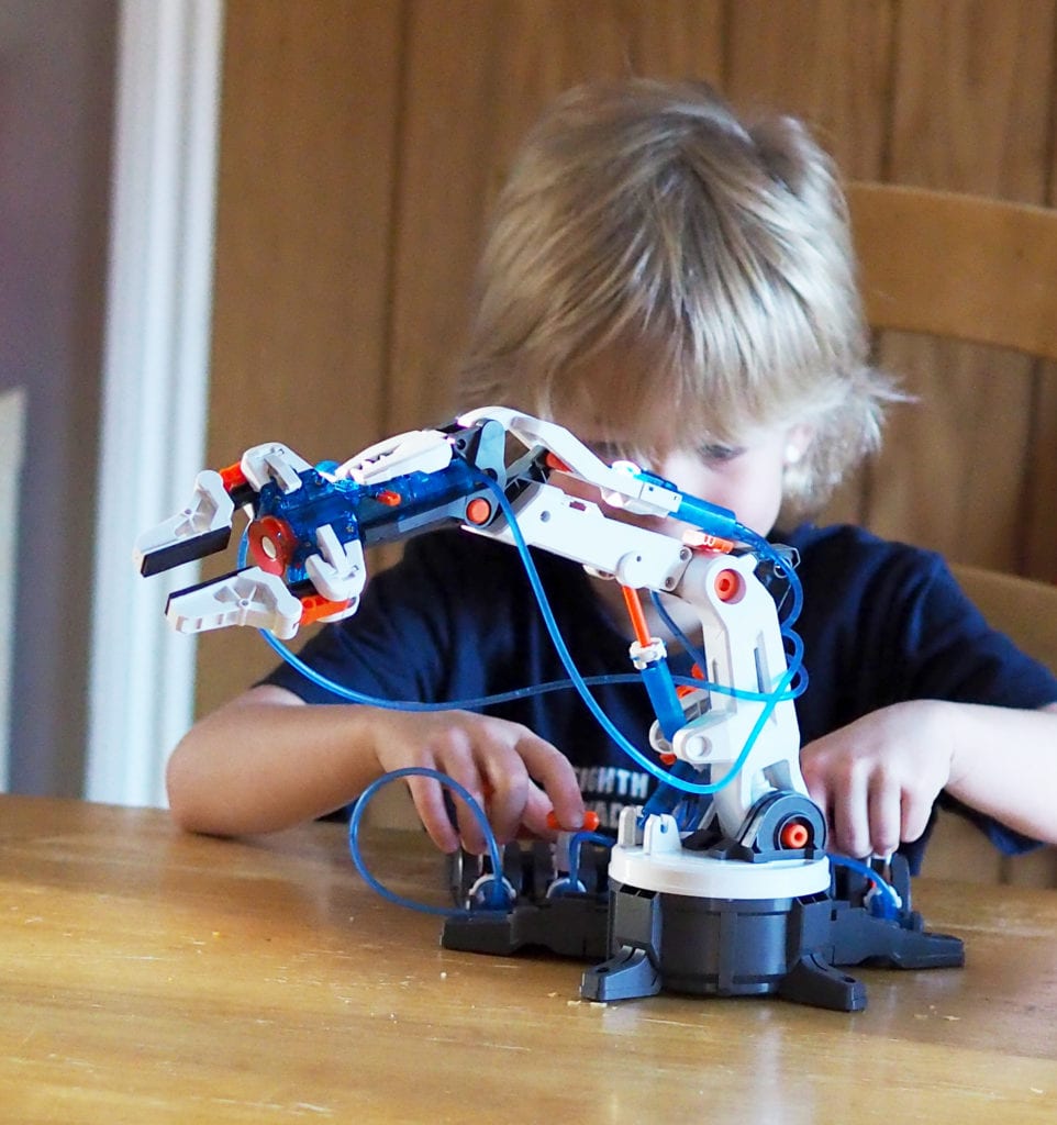 Hydraulic Robot Arm Review Logan playing with arm on table