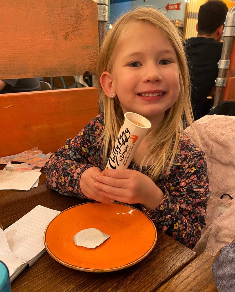 Aria eating an ice lolly at Las Iguanas