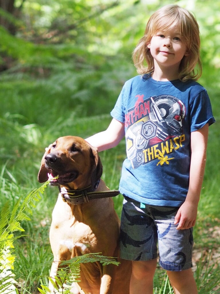 Florence and Logan in the woods